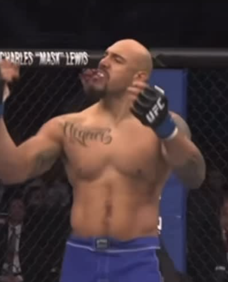 Lavar Johnson celebrating a win inside the UFC Octagon