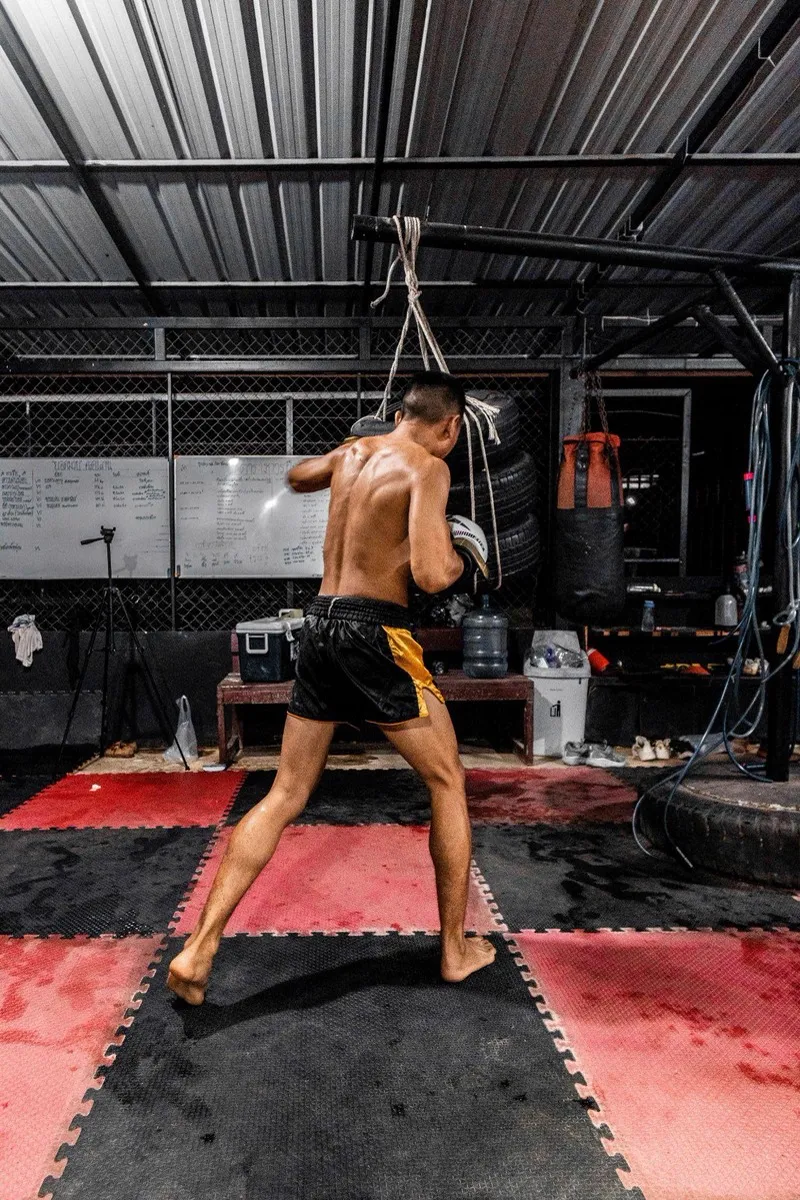 A fighter trains for events that require bare knuckle boxing tickets in California.
