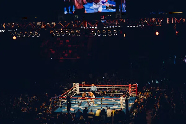 Bare-knuckle boxing event in Fresno with fans watching live action.