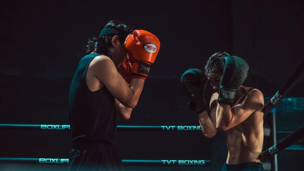 Bare-knuckle fighters exchanging punches in the ring